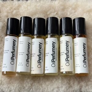 6 Roller ball perfume oil replicas, Made in France, quality made. O.34oz